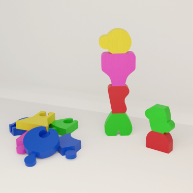 Full toyset of Mix-a-Majigs, with one pile unassembled and two towers stacked