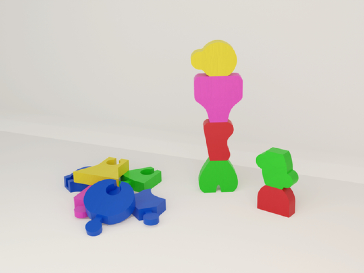 Full toyset of Mix-a-Majigs, with one pile unassembled and two towers stacked